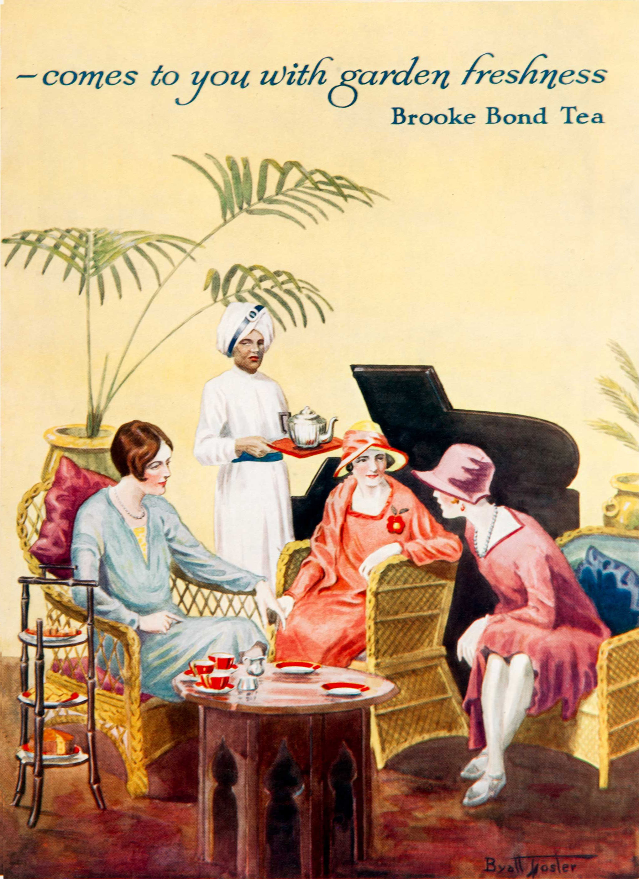 A drawing shows three Caucasian women sitting around a wooden table with teacups on it. An Indian man, wearing a white uniform and a white turban, carries a tray with a teapot and stands behind them. A piano and a large plant are seen in the background. On the top are the words, “Comes to you with garden freshness, Brooke Bond tea.” 